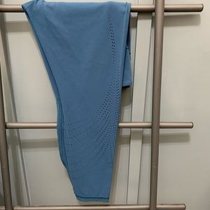 Athleta elation lazer cut 7/8 tight. Blue. Lrg.